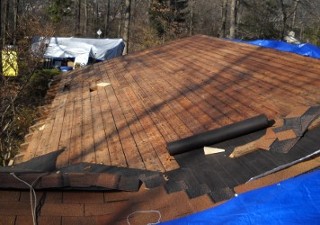 other half of the roof cleared after shingles done on first half