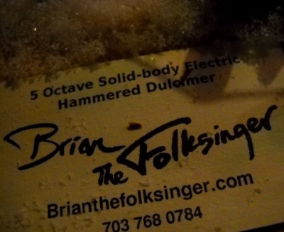 Brian the Folksinger business card on the dulcimer in the snow