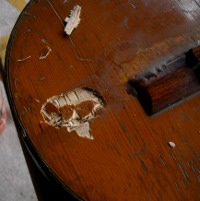 guitar being repaired