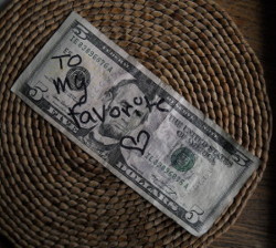 5 dollar bill with to my favorite and a heart written on it