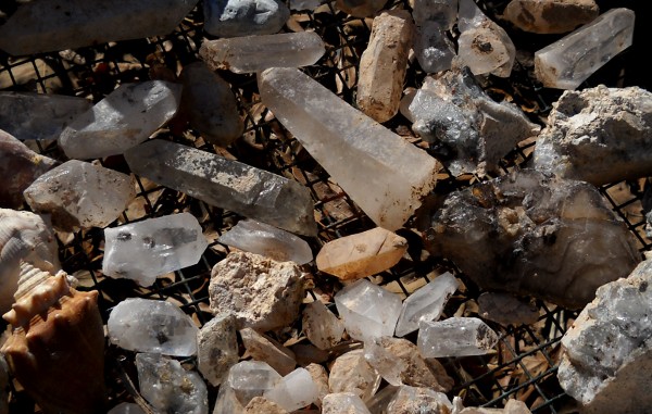 closeup of quartz crystals laid out in the sun
