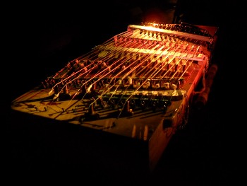 dulcimer in the studio under colored stagelights